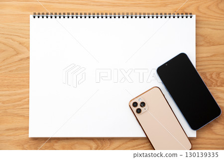 Sketchbook and smartphone 130139335