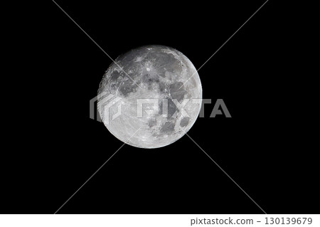Luminous Full Moon Displaying Intricate Crater Details Against Deep Black Night Sky Luminous Full Moon Displaying Intricate Crater Details Against Deep Black Night Sky 130139679