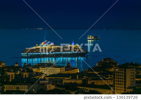 Illuminated Cruise Ships Anchored in Trieste City Harbor During Twilight Blue Hour 130139720