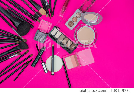 Vibrant Pink Makeup Collection Featuring Professional Brushes and Cosmetic Palettes in Artistic Flat Lay Arrangement Vibrant Pink Makeup Collection Featuring Professional Brushes and Cosmetic Palettes in Artistic Flat Lay Arrangement 130139723
