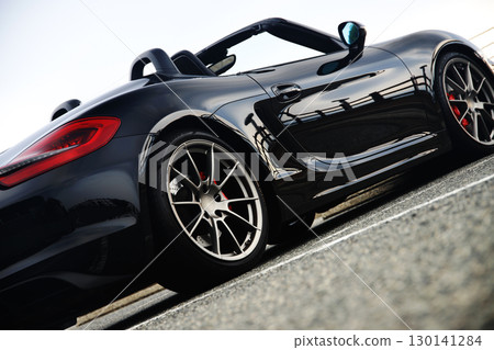 A shiny black convertible A shiny black convertible 130141284