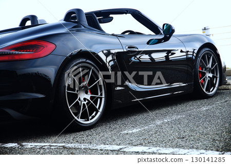 A shiny black convertible A shiny black convertible 130141285