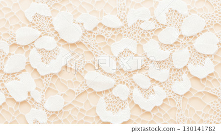 Lace textile background featuring intricate floral patterns, perfect for creative design projects 130141782