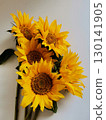 Bright yellow sunflowers bouquet on white background close-up 130141905