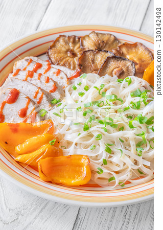 Rice Noodles with Shiitake, Grilled Peppers, Chicken, Sriracha, and Green Onion 130142498