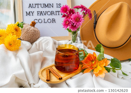 Letter board with text AUTUMN IS MY FAVORITE COLOR Fall Bouquet for Thanksgiving holiday. Seasonal Warm colorful blossom flowers arrangement festive decoration. Selective 130142620