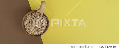 Raw oatmeal porridge copy space. Whole spelt grain species. High protein fiber-rich vegan plant based food ingredient. Gluten free superfood healthy nutritional dietary alternative Raw oatmeal porridge copy space. Whole spelt grain species. High protein fiber-rich vegan plant based food ingredient. Gluten free superfood healthy nutritional dietary alternative 130142646