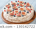 Whole cream cheese berry layer cake topped figs currant blueberries 130142722