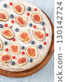 Whole cream cheese berry layer cake topped figs currant blueberries 130142724