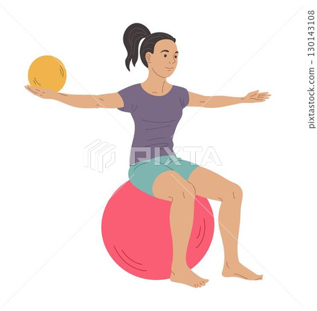 Girl exercising on gym ball with small ball in hand, pediatric physiotherapy 130143108