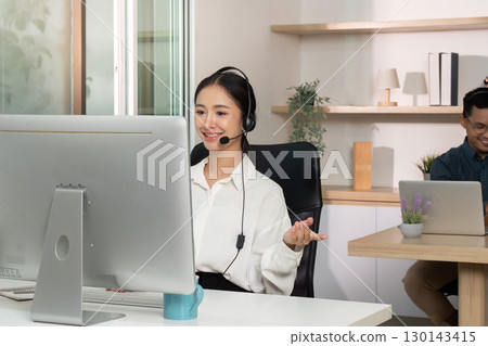 Call Center Agent Providing Customer Support with Headset Call Center Agent Providing Customer Support with Headset 130143415