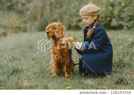 Friends are having fun in the fresh air. Child in a blue coat. Friends are having fun in the fresh air. Child in a blue coat. 130143530