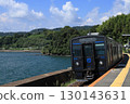 Omura Line train running along Omura Bay in summer 130143631