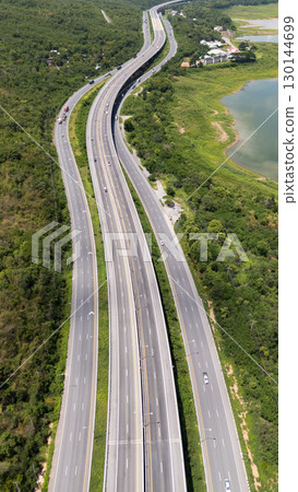 Drone shot The M6 motorway Nakhon Ratchasima Province - Bang Pa-in Lam Ta Khong River and Mountain. Motorway Korat Thailand 130144699