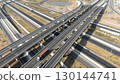 Drone shot aerial view of high angle view of intersection across the bridge against the countryside highway 130144741
