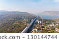 Drone shot aerial view landscape of the M6  motorway Expressway Nakhon Ratchasima Province - Bang Pa-in. Lam Ta Khong River and Mountain. Drone shot of scenic landscape rural place traffic. Nakhon 130144744
