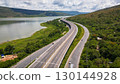 Drone shot The M6 motorway Nakhon Ratchasima Province - Bang Pa-in Lam Ta Khong River and Mountain. Motorway Korat Thailand 130144928