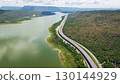 Drone shot The M6 motorway Nakhon Ratchasima Province - Bang Pa-in Lam Ta Khong River and Mountain. Motorway Korat Thailand 130144929