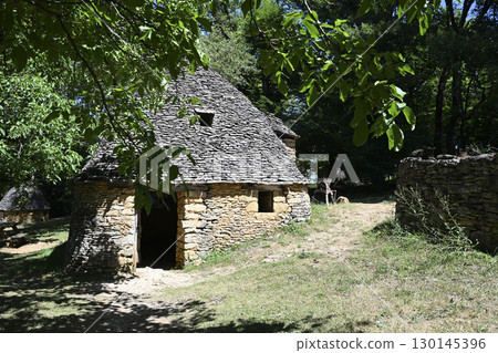 Historic dry stone agricultural buildings in Dordogne, France, showcasing traditional architecture Historic dry stone agricultural buildings in Dordogne, France, showcasing traditional architecture 130145396
