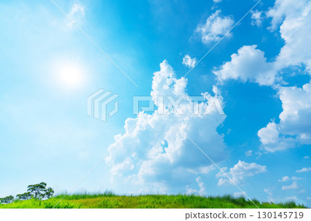 Blue sky, clouds, sun and grassland Blue sky, clouds, sun and grassland 130145719