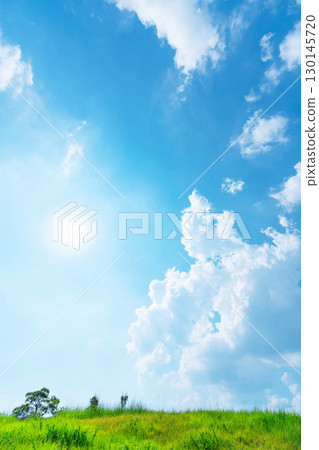 Blue sky, clouds, sun and grassland Blue sky, clouds, sun and grassland 130145720