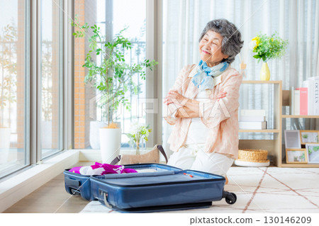 Senior woman traveling Senior woman traveling 130146209