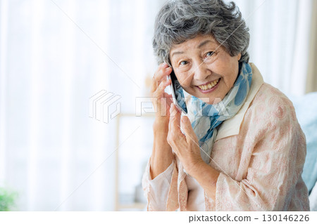 Senior woman using a smartphone 130146226