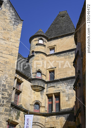Exploring medieval architecture in Sarlat, Dordogne, reflecting the history and culture of Perigord 130146472