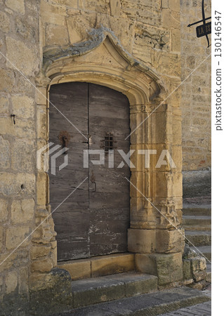 Exploring the historic charm of Sarlat in Dordogne, France with ancient stone architecture and a 130146547