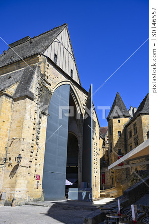 Exploring the covered market in an ancient church in Sarlat, Dordogne, showcasing unique local Exploring the covered market in an ancient church in Sarlat, Dordogne, showcasing unique local 130146552
