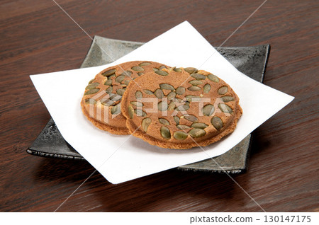 Nanbu rice crackers with pumpkin seeds Nanbu rice crackers with pumpkin seeds 130147175