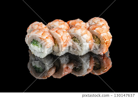 Japanese sushi rolls with shrimp cucumber and cream cheese on black background 130147637