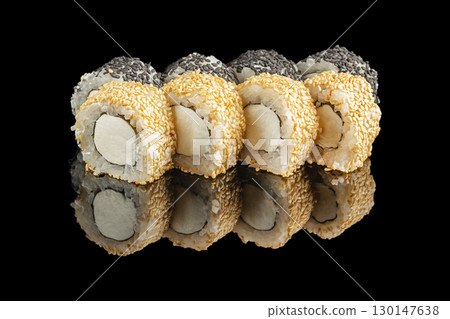Japanese sushi rolls with sesame seeds and cream cheese on black background 130147638