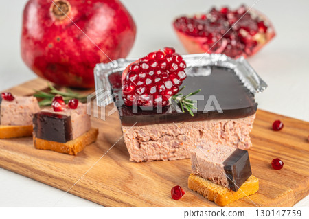 Gourmet pate with pomegranate and jelly glaze served on bread 130147759