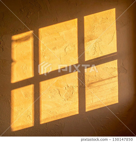 Abstract Sunlight Window Shadow on Rustic Wall Texture with Geometric Design Pattern 130147850