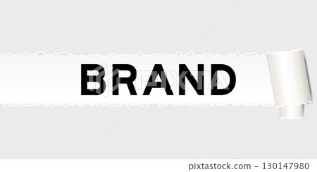 Ripped gray paper background that have word brand under torn part 130147980