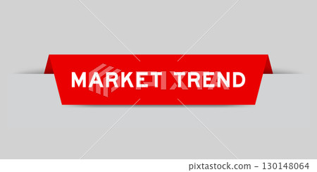 Red color inserted label with word market trend on gray background 130148064
