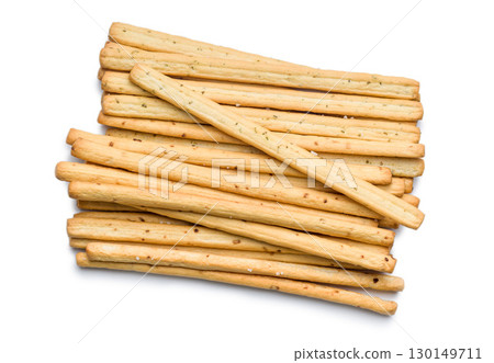 Crispy grissini breadsticks isolated on white background. Crispy grissini breadsticks isolated on white background. 130149711