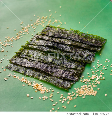 Vibrant Seaweed Strips with Sesame Seeds 130149776