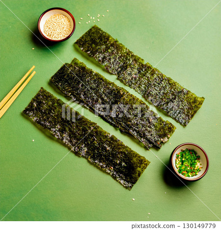 Vibrant Seaweed Strips with Sesame Seeds 130149779