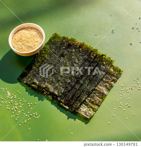 Vibrant Seaweed Strips with Sesame Seeds 130149781