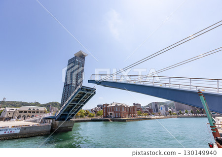 Retro scenery of Mojiko Port in Fukuoka Prefecture: Mojiko High Mart and Blue Wing Drawbridge Retro scenery of Mojiko Port in Fukuoka Prefecture: Mojiko High Mart and Blue Wing Drawbridge 130149940