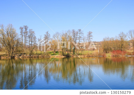 Spring Landscape at the Lake with Reflections Spring Landscape at the Lake with Reflections 130150279