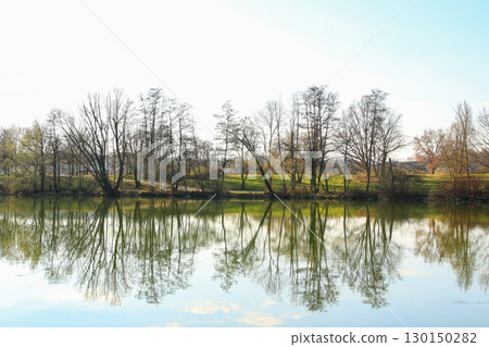 Spring Landscape at the Lake with Reflections Spring Landscape at the Lake with Reflections 130150282