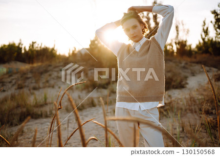 Portrait of elegant, luxury woman posing in nature. People, lifestyle, relaxation concept. Portrait of elegant, luxury woman posing in nature. People, lifestyle, relaxation concept. 130150568