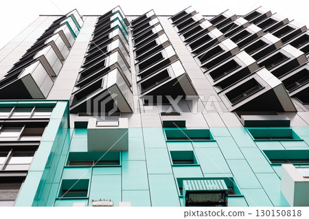 Modern high-rise apartment building in a vibrant residential area with available rental and mortgage Modern high-rise apartment building in a vibrant residential area with available rental and mortgage 130150818