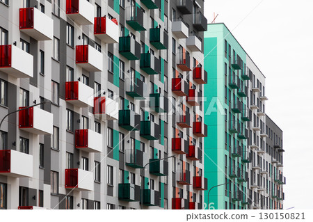 Modern high-rise apartment buildings with colorful balconies in a residential area suitable for rent Modern high-rise apartment buildings with colorful balconies in a residential area suitable for rent 130150821