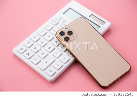 White calculator and smartphone 130151545