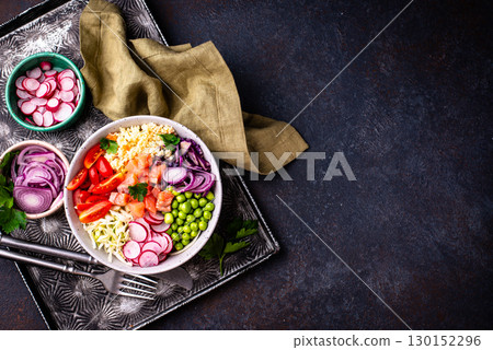 Balanced healthy bowl with vegetables and salmon 130152296