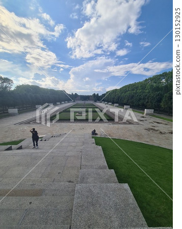 Berlin, Germany - August 1, 2025: The Soviet War Memorial, a war memorial and military cemetery in Berlin's Treptower Park. It was built to the design of the Soviet architect Yakov Belopolsky Berlin, Germany - August 1, 2025: The Soviet War Memorial, a war memorial and military cemetery in Berlin's Treptower Park. It was built to the design of the Soviet architect Yakov Belopolsky 130152925